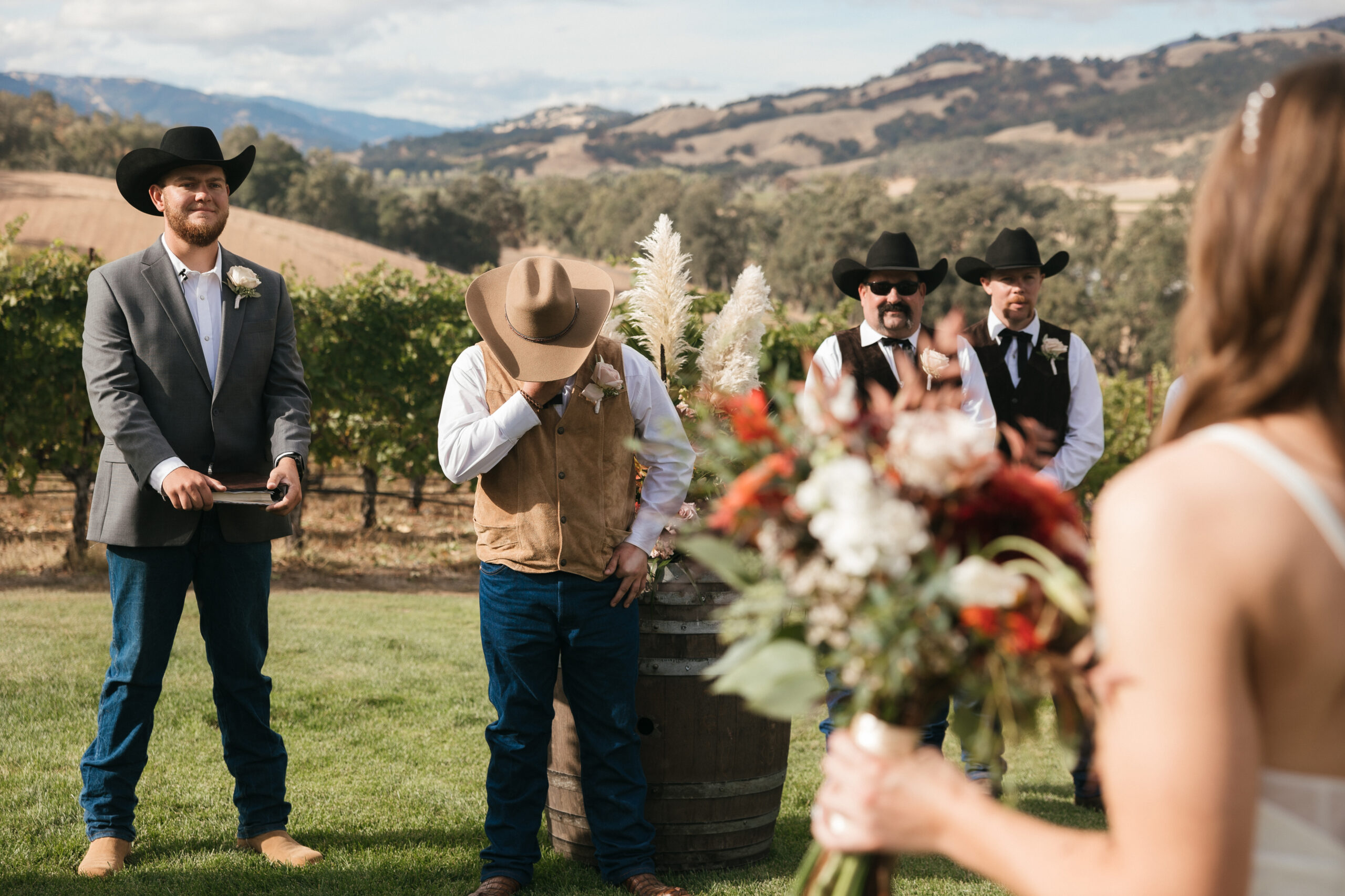 Groom tears up as he sees his bride walking down the isle